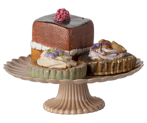Mini cakes on cake tray  