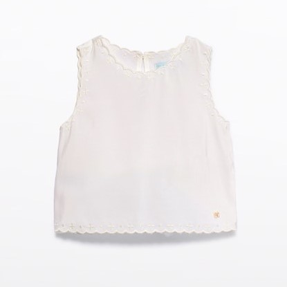 Top with embroidery cream 